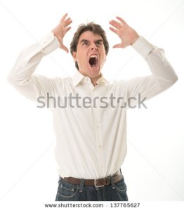 stock-photo-furious-young-man-yelling-137765627